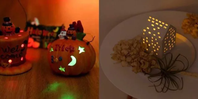 Trick or Treatの文字が入ったかぼちゃ置物と、ビル型キャンドルホルダーのイルミネーション
